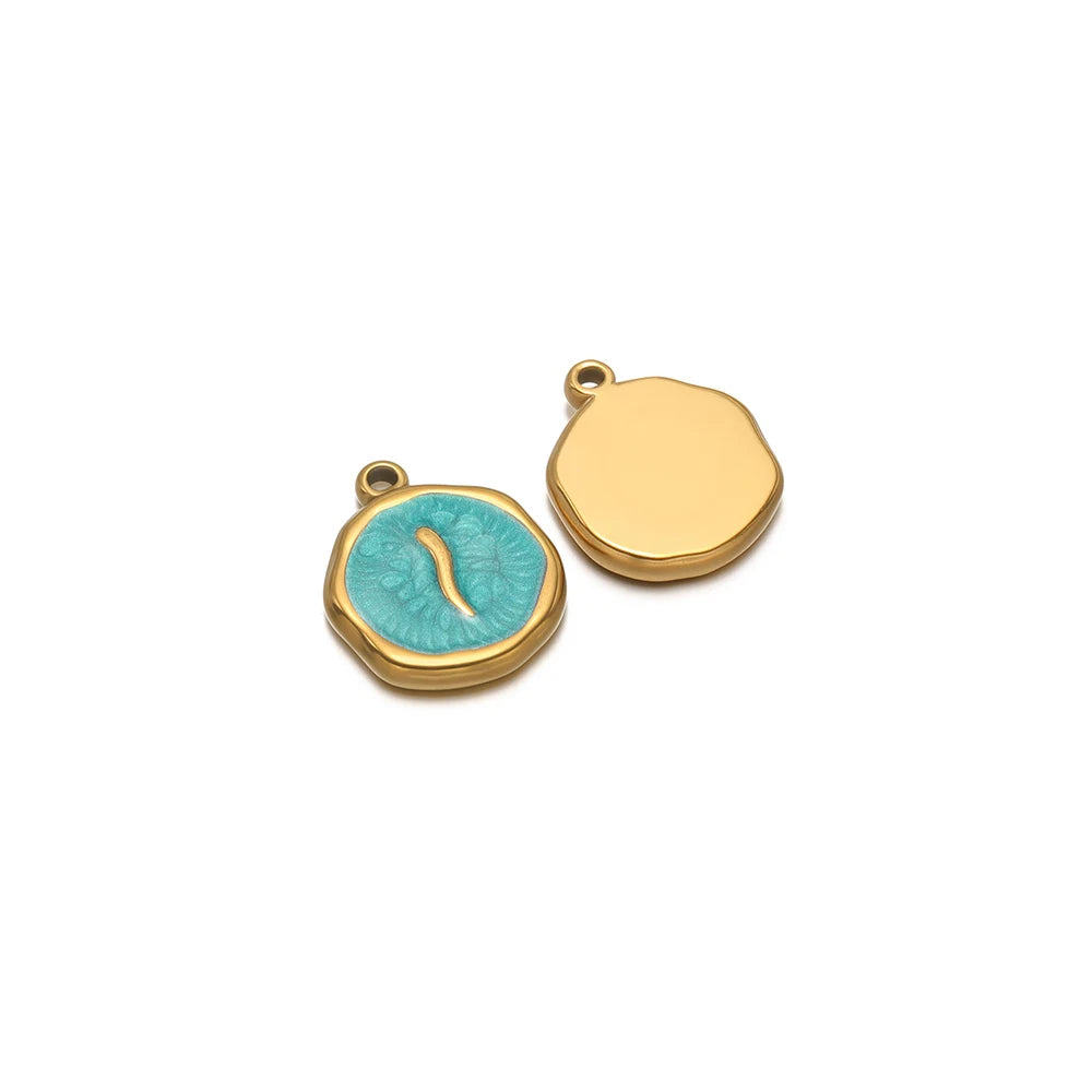 Round enamel charm pendant with gold border, turquoise snake design and plain gold charm