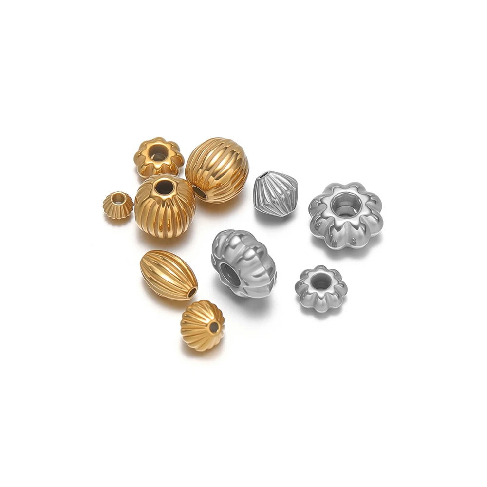 Gold and silver pumpkin striped spacer beads with flower-style end caps