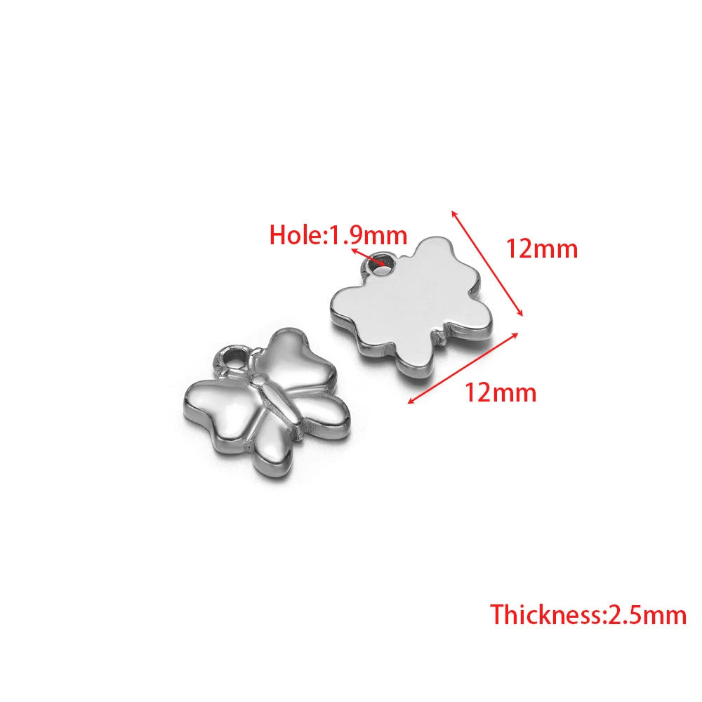 Stainless steel clover and star charms with jump ring holes, silver-tone pair