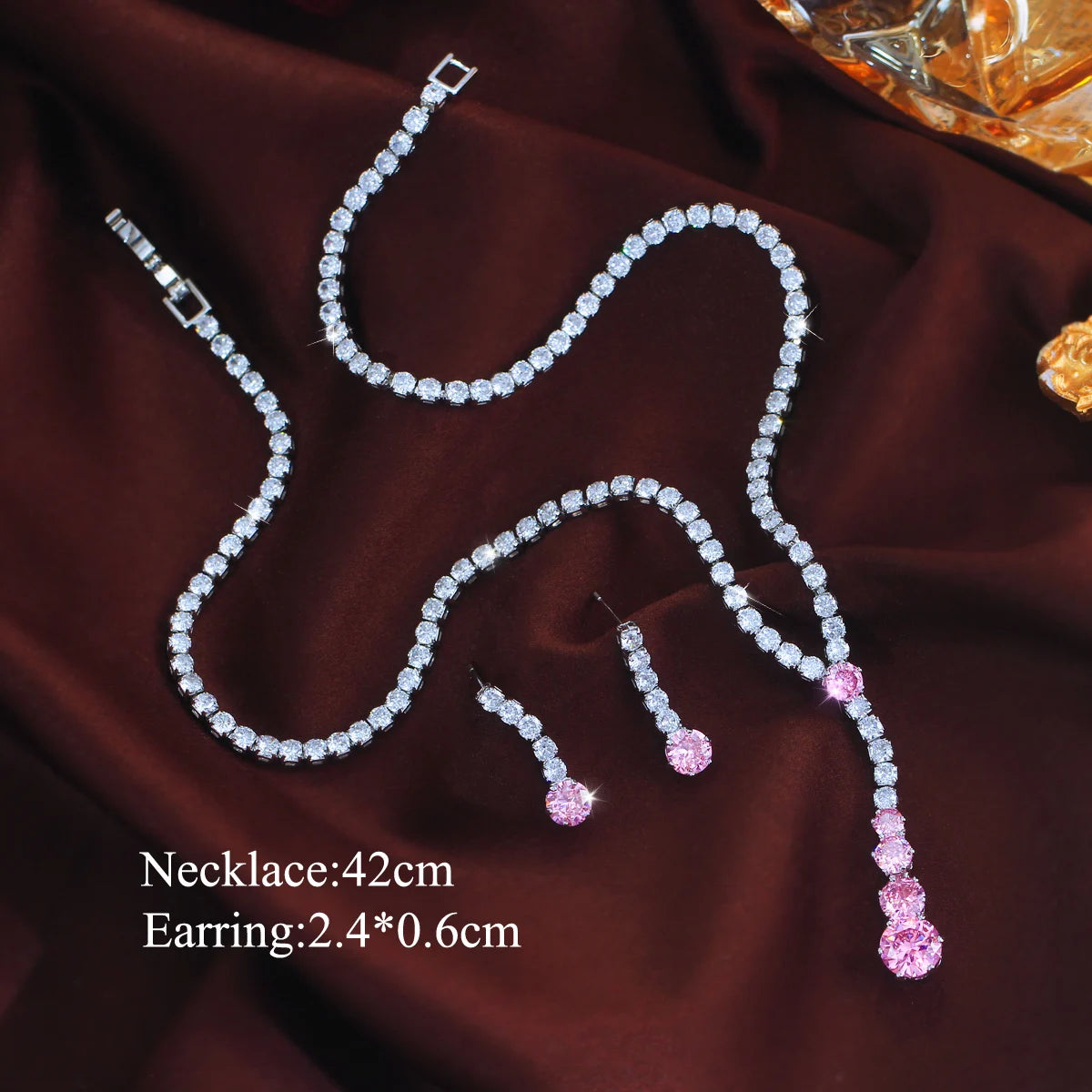 Cubic zirconia necklace and matching pink drop earrings; necklace is 42 cm long