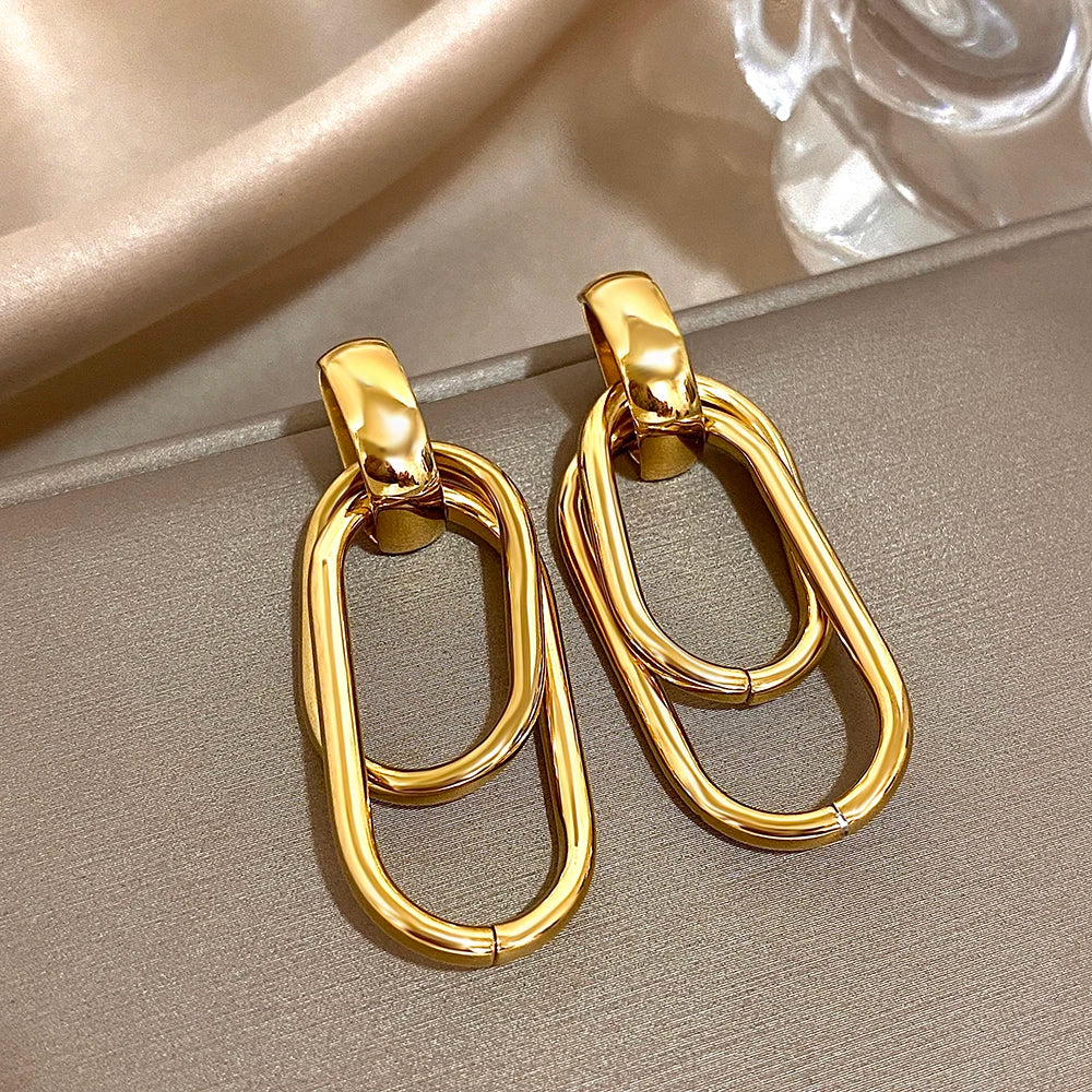Glossy gold drop earrings with layered oval links