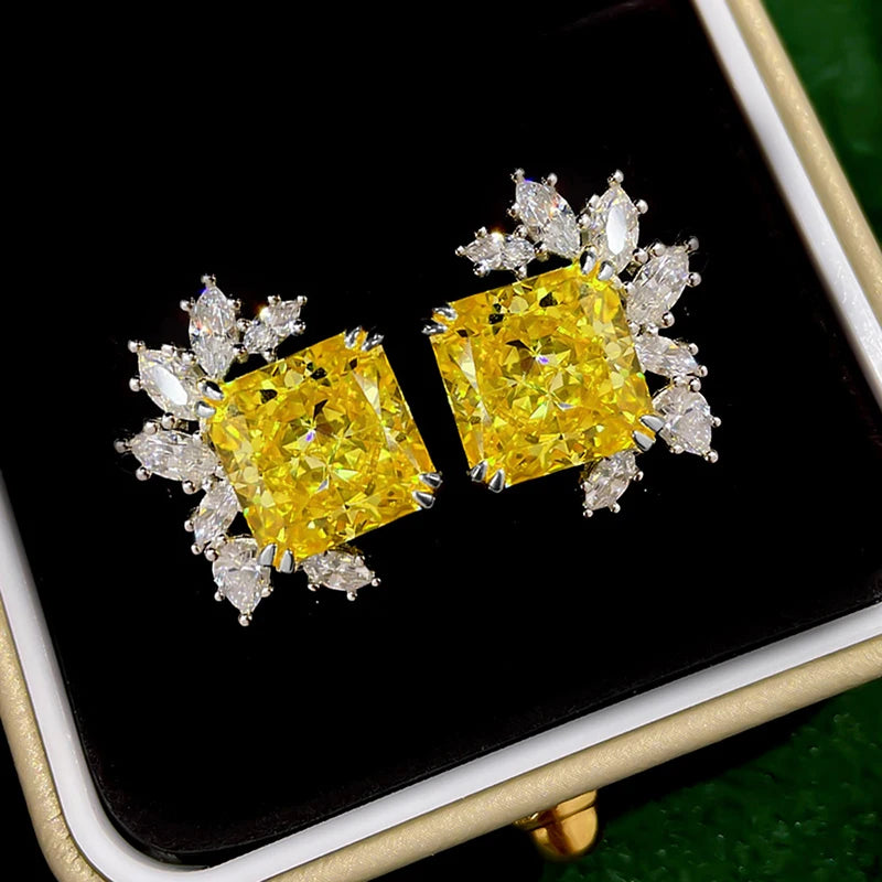 Yellow square cubic zirconia stud earrings with clear crystal halo, in box