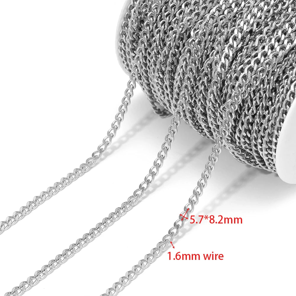 Steel Cuban link chain on spool, close-up of chain links and hanging strands