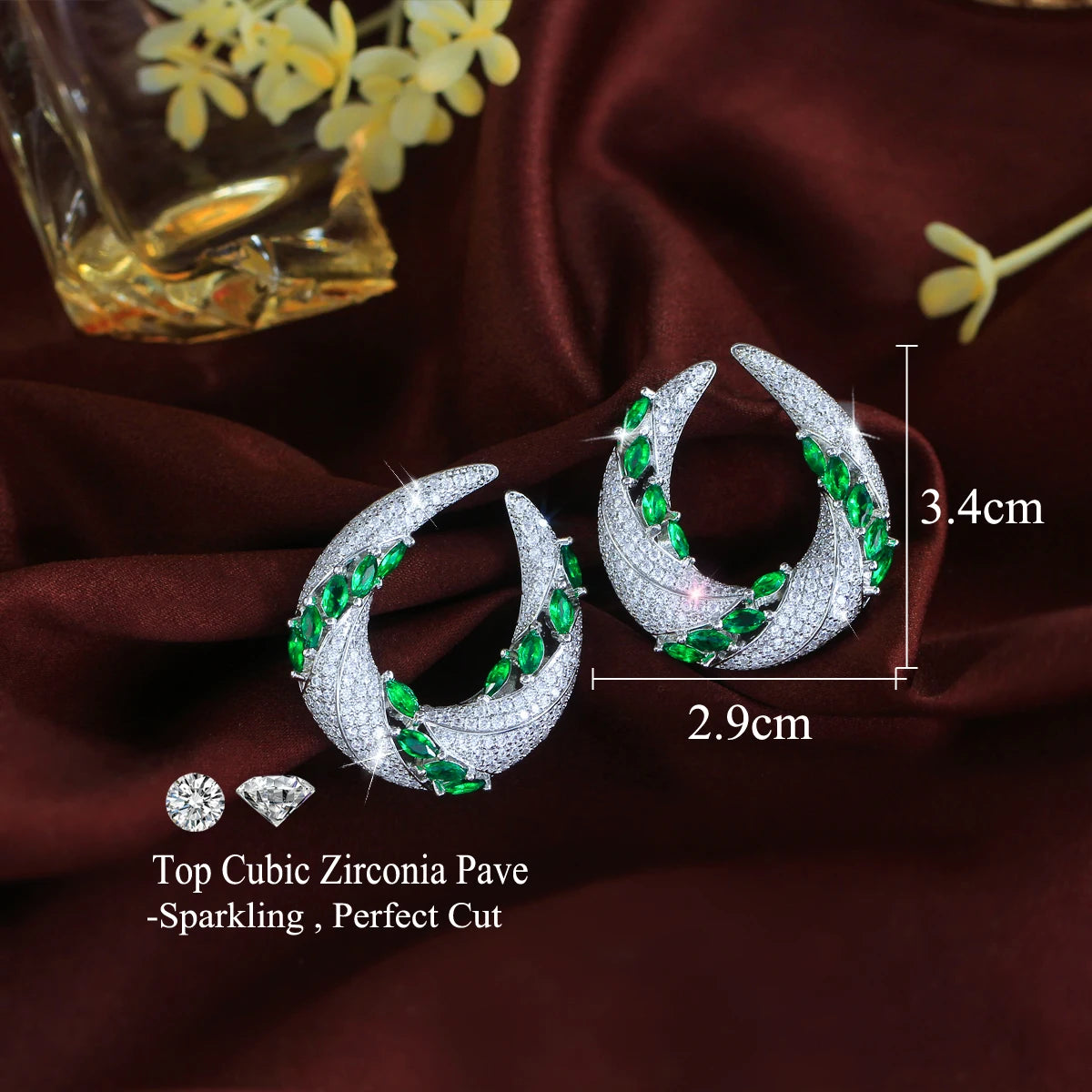Green and white cubic zirconia crescent earrings, 3.4 cm tall and 2.9 cm wide