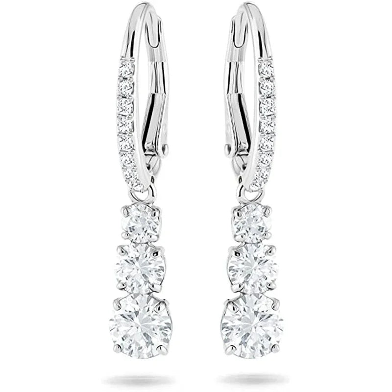Silver-tone cubic zirconia drop hoop earrings with three dangling round stones
