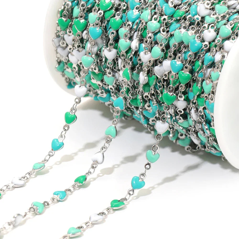 Silver-tone heart link chain with mint-green enamel heart charms and small links