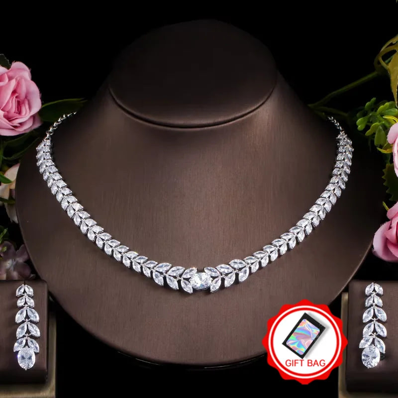 Silver-tone cubic zirconia necklace and leaf-shaped drop earrings