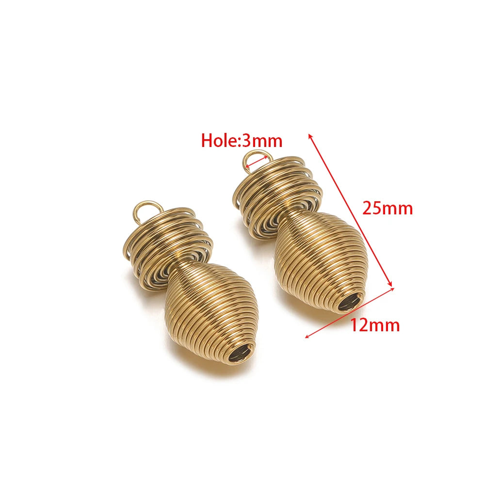 Gold-tone spring-effect wire charm pendants with loop holes, pair of coil shapes
