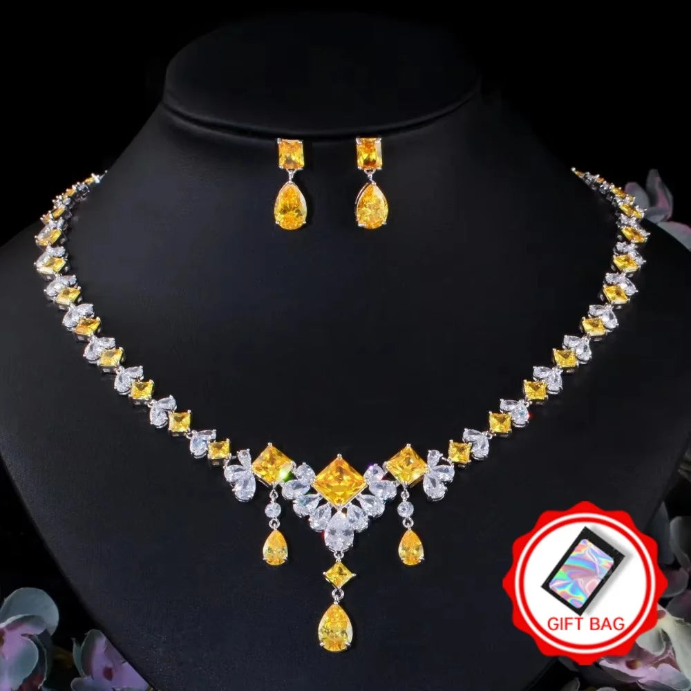 Yellow and clear cubic zirconia necklace and earrings with a gift bag