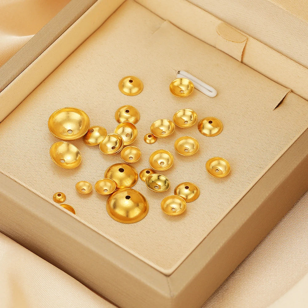 Gold-tone spacer bead caps with round dome tops and center holes, jewelry making