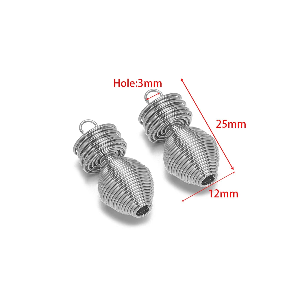 Silver-tone spring-effect wire charm pendants with loop holes, pair of coil shapes