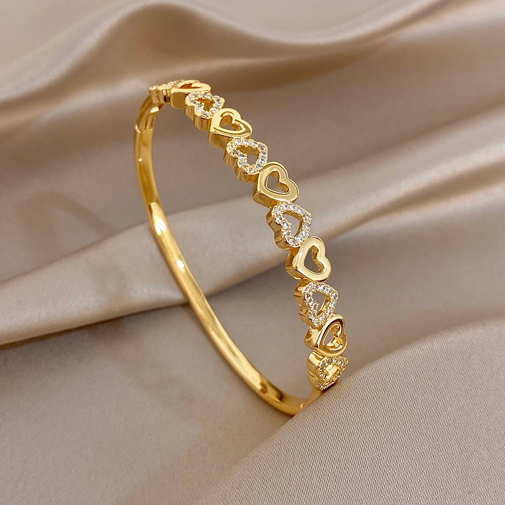 Gold heart zircon cuff bracelet