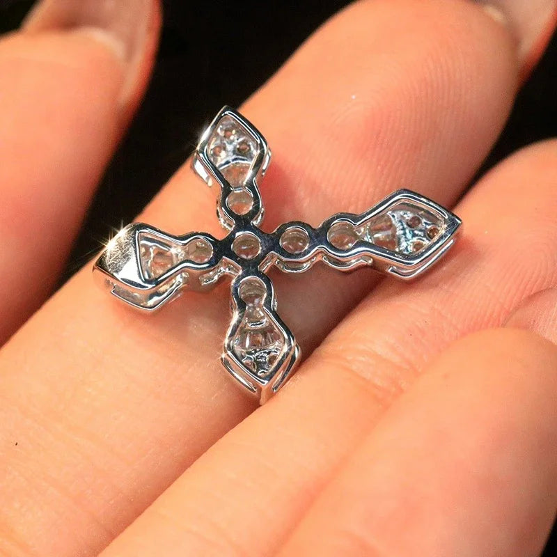 Close-up of crystal cross pendant necklace with framed sparkle stones