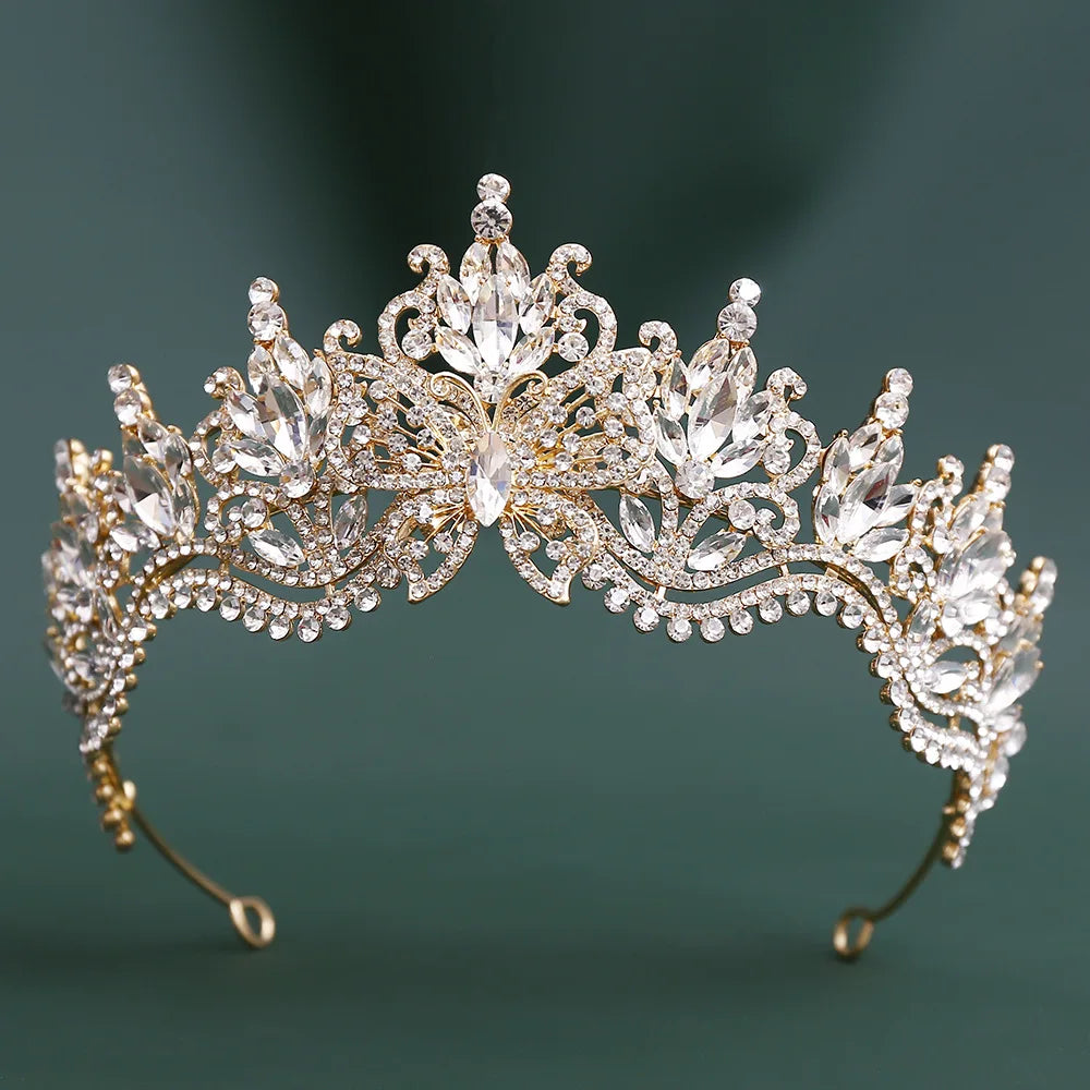 Clear crystal rhinestone tiara headband with central gem and floral scrolls