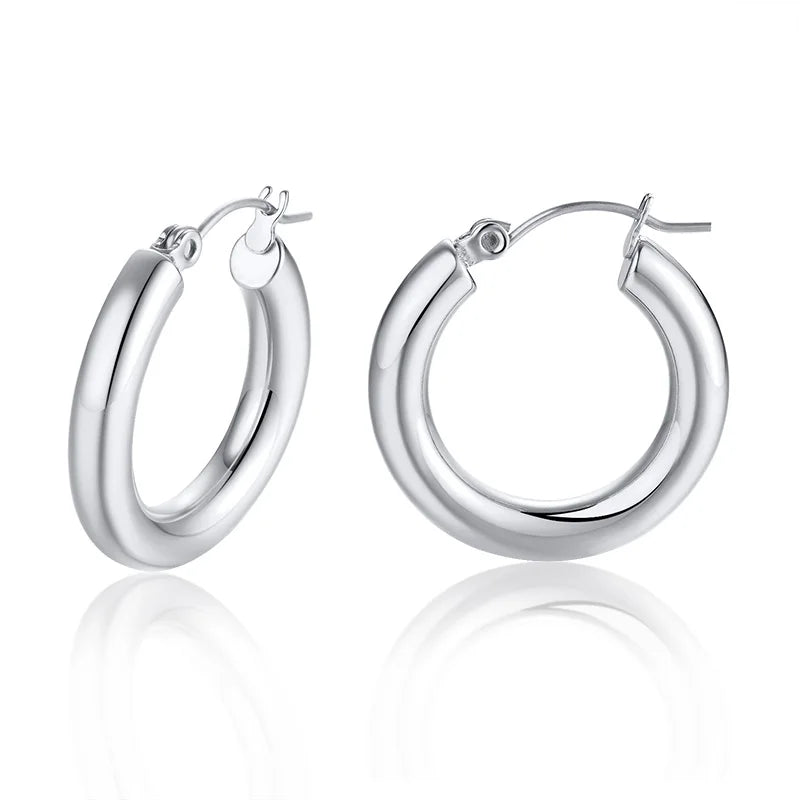 Silver-tone thick round hoop earrings with hinged closures