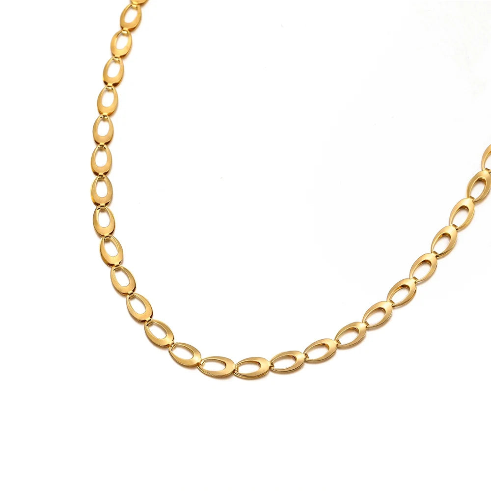 Gold oval-link chain necklace, hollow teardrop style links, partial view