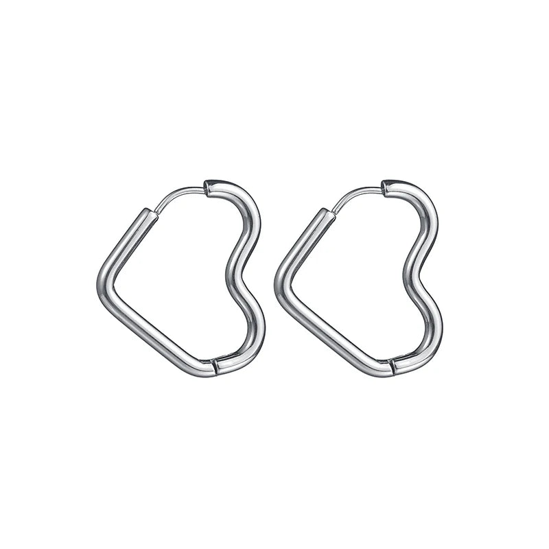 Silver-tone wavy heart-shaped hoop earrings with hinged clasp, glossy stainless steel