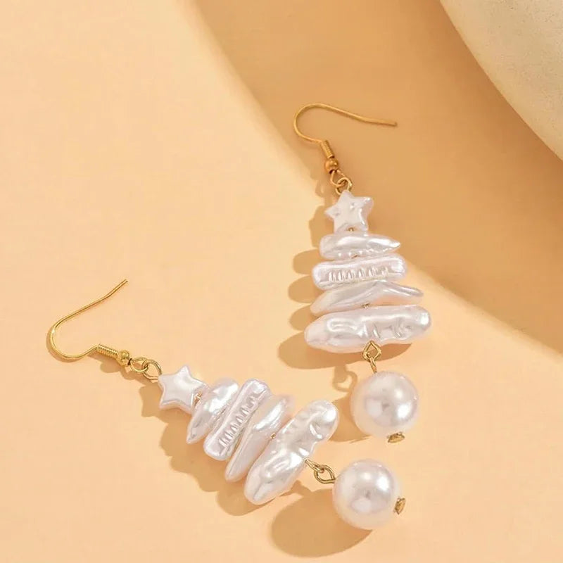 Gold-tone drop earrings with stacked tree charms, faux pearls, star top