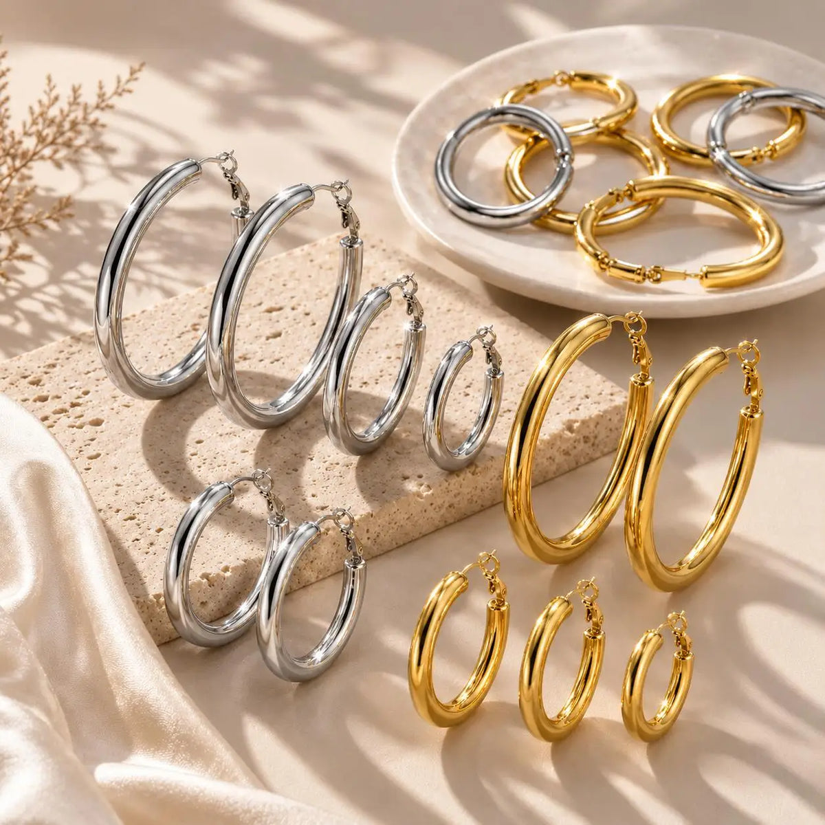 Gold and silver chunky hoop earrings in assorted sizes