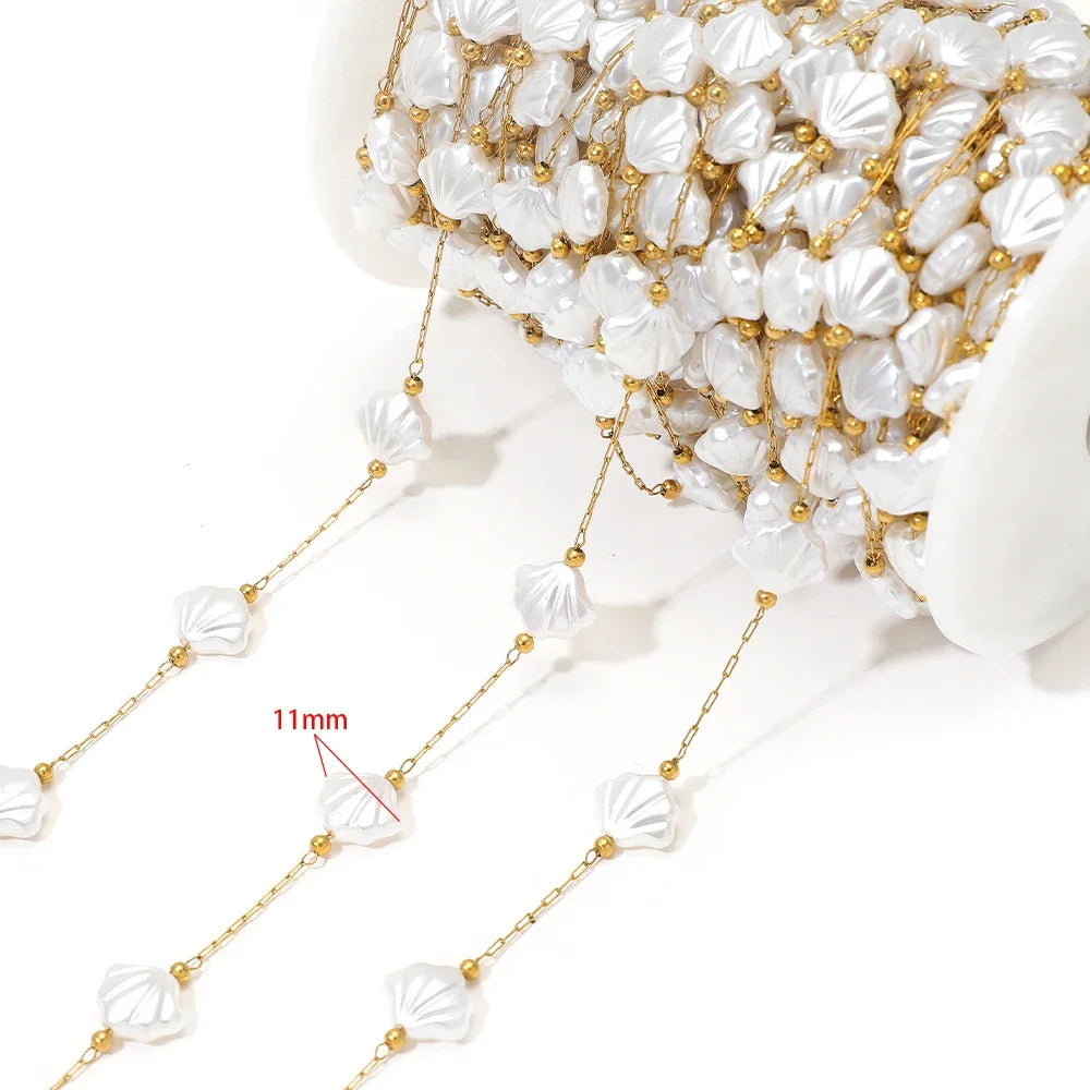 Gold-tone chain with white artificial pearl flower charms, 11mm size shown