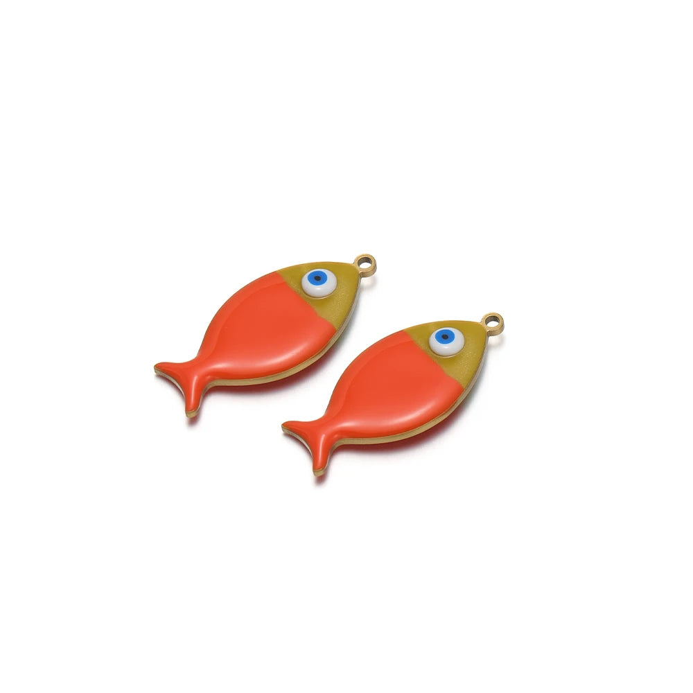 Two orange enamel fish charms with gold-tone loops and blue eye accents