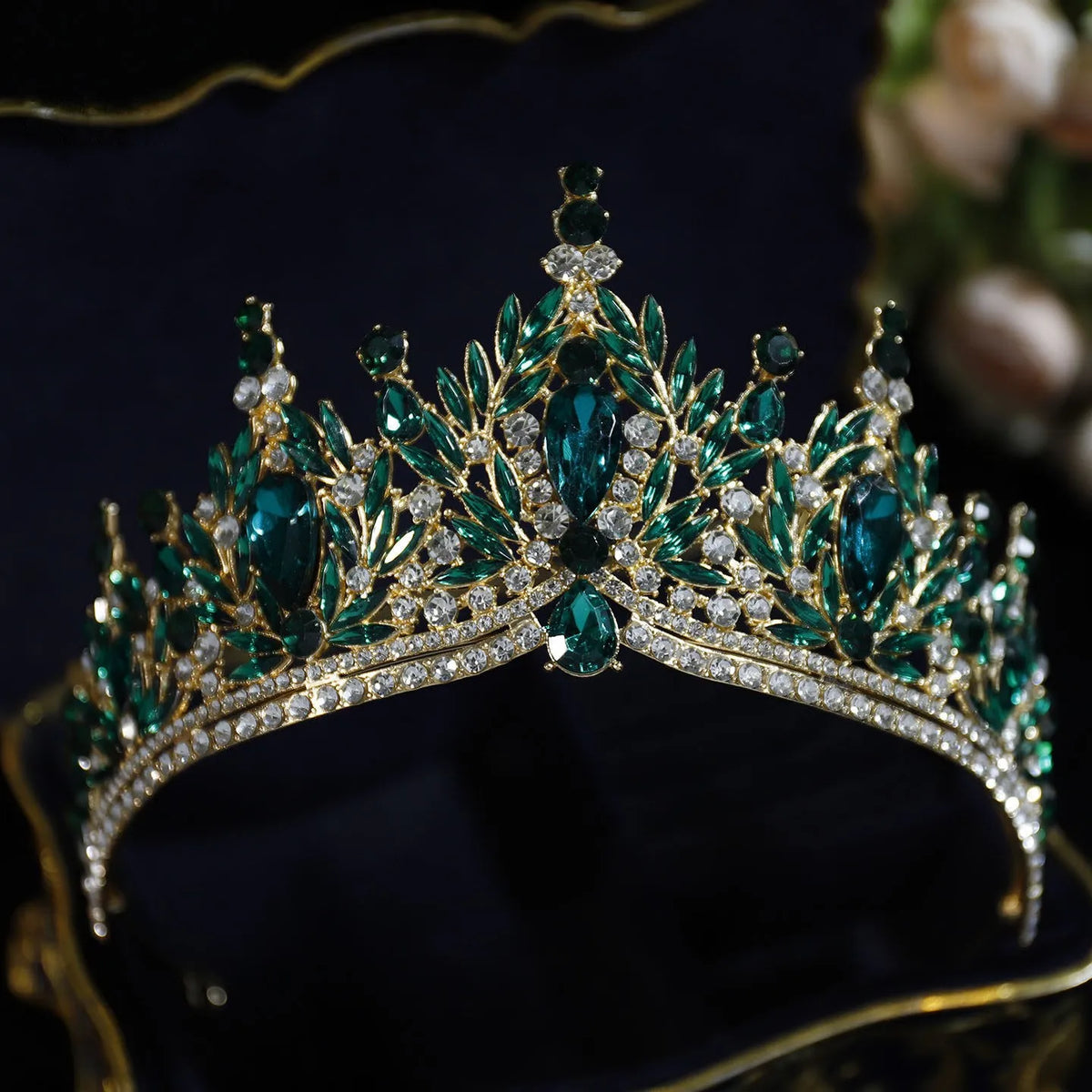 Emerald green and blue rhinestone tiara crown with leafy crystal accents