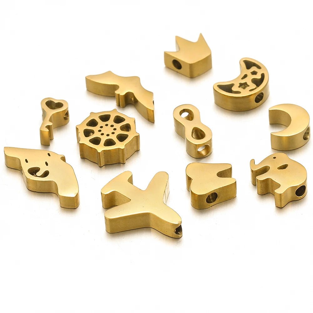 Gold-tone stainless steel spacer beads set, assorted animal and symbol shapes