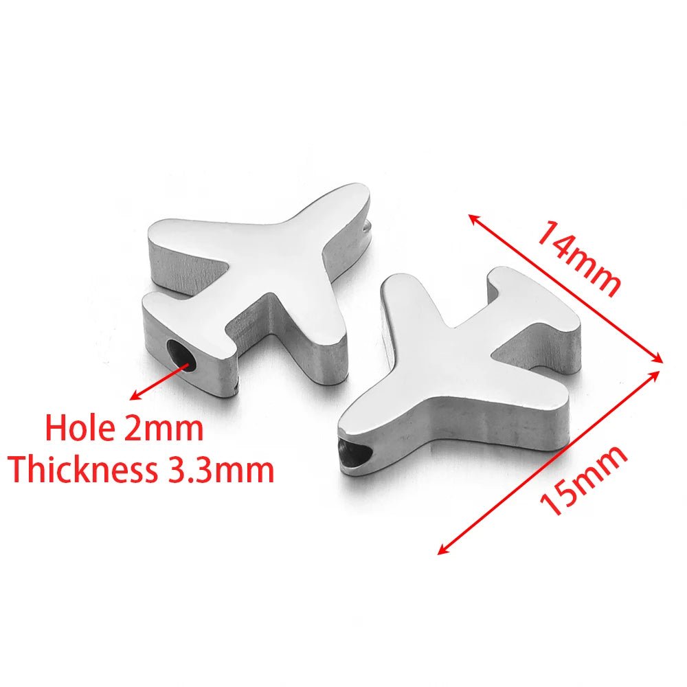 Silver-tone airplane-style stainless steel spacer beads with side holes, pair view