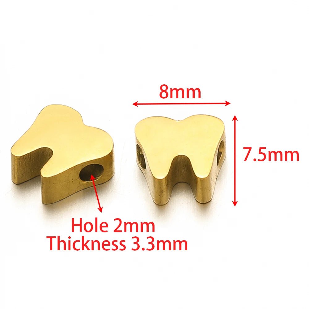 Gold-tone stainless steel spacer bead with openwork star-like cutout and round hole