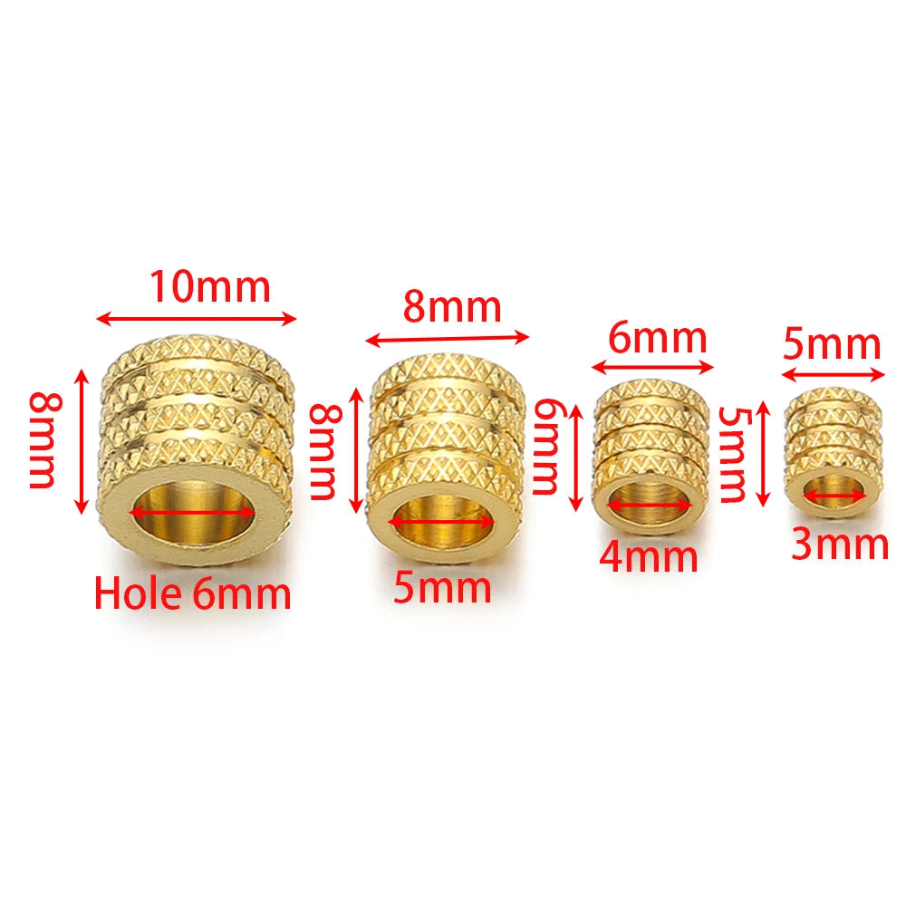 Gold-tone spacer beads with textured pattern, showing multiple bead heights and hole sizes