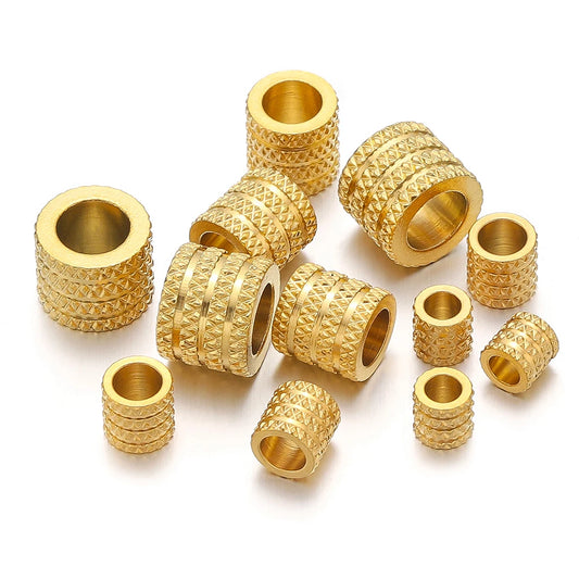 Gold-tone large-hole spacer beads with textured diamond pattern and central hole