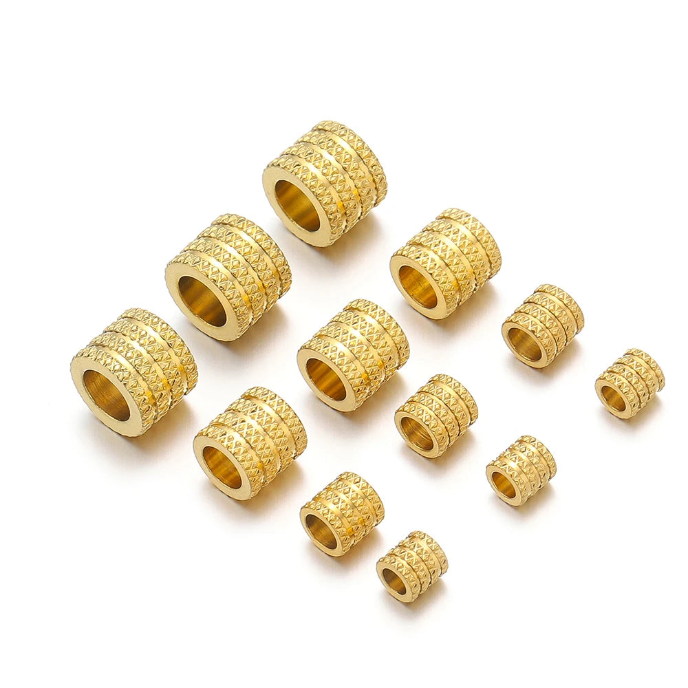 Gold-tone large-hole spacer beads, textured diamond pattern with open center hole