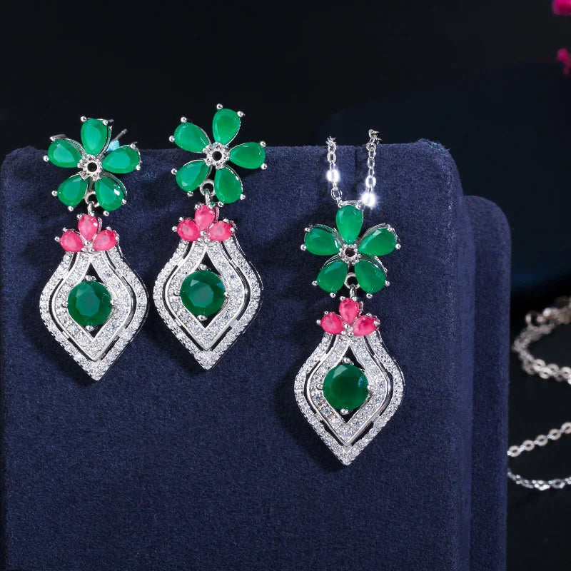 Silver-tone floral jewelry set with green and pink crystal drop earrings and matching pendant