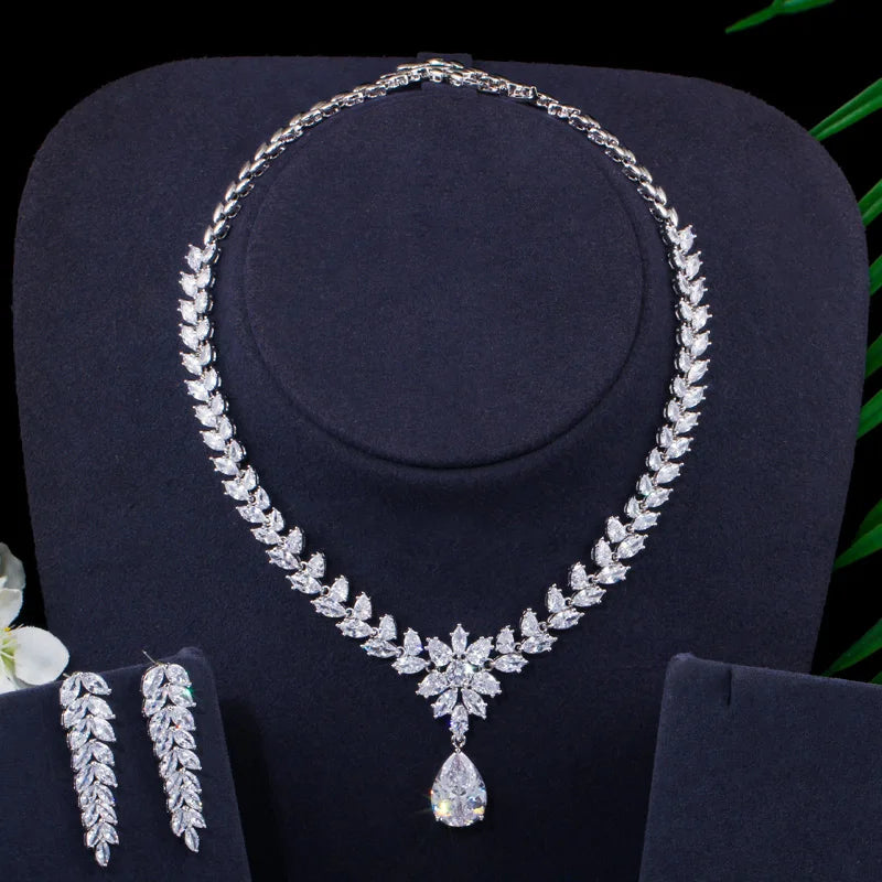 Silver-toned bridal necklace with teardrop pendant and matching CZ drop earrings