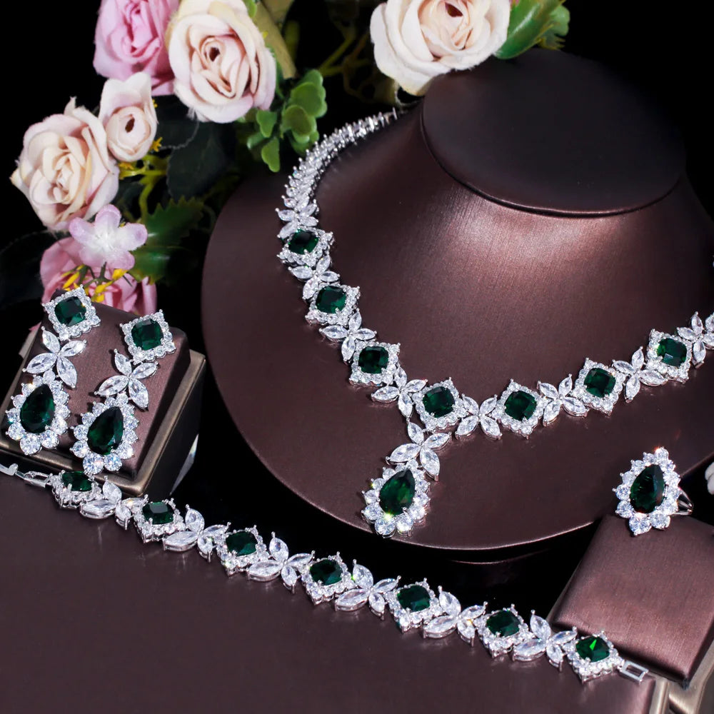 Silver-tone bridal jewelry set with green CZ necklace, matching bracelet and earrings