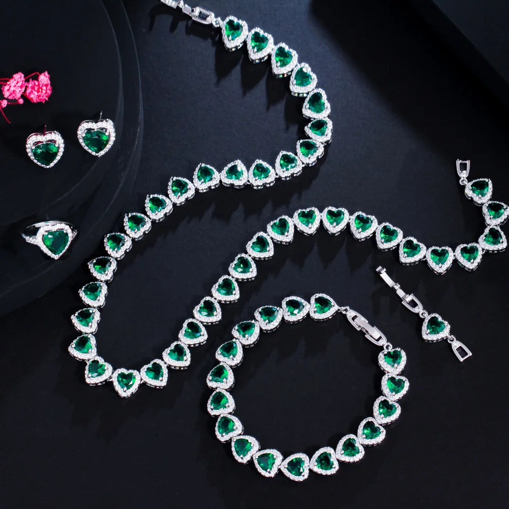 Green heart cubic zirconia bridal jewelry set: necklace, bracelet, earrings, and ring