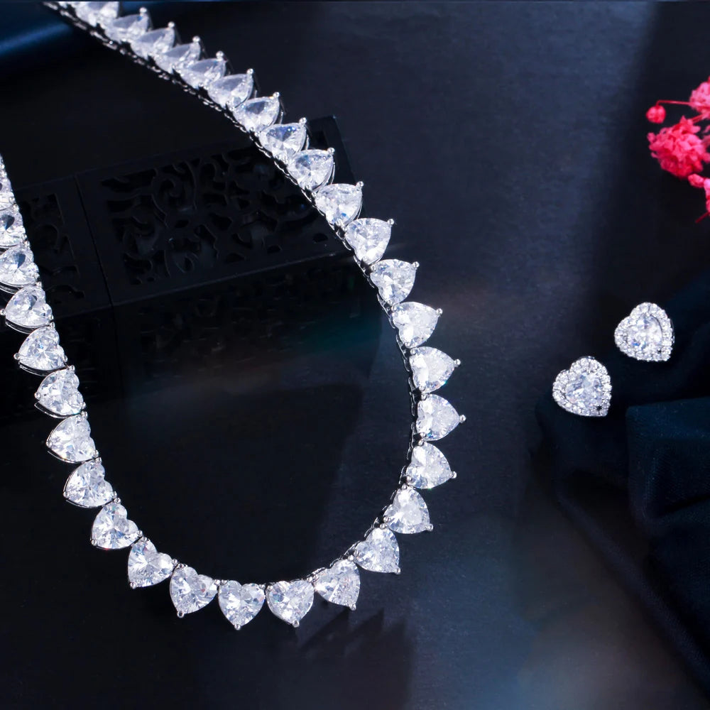 Heart cubic zirconia choker necklace and heart stud earrings set, silver-tone jewelry.