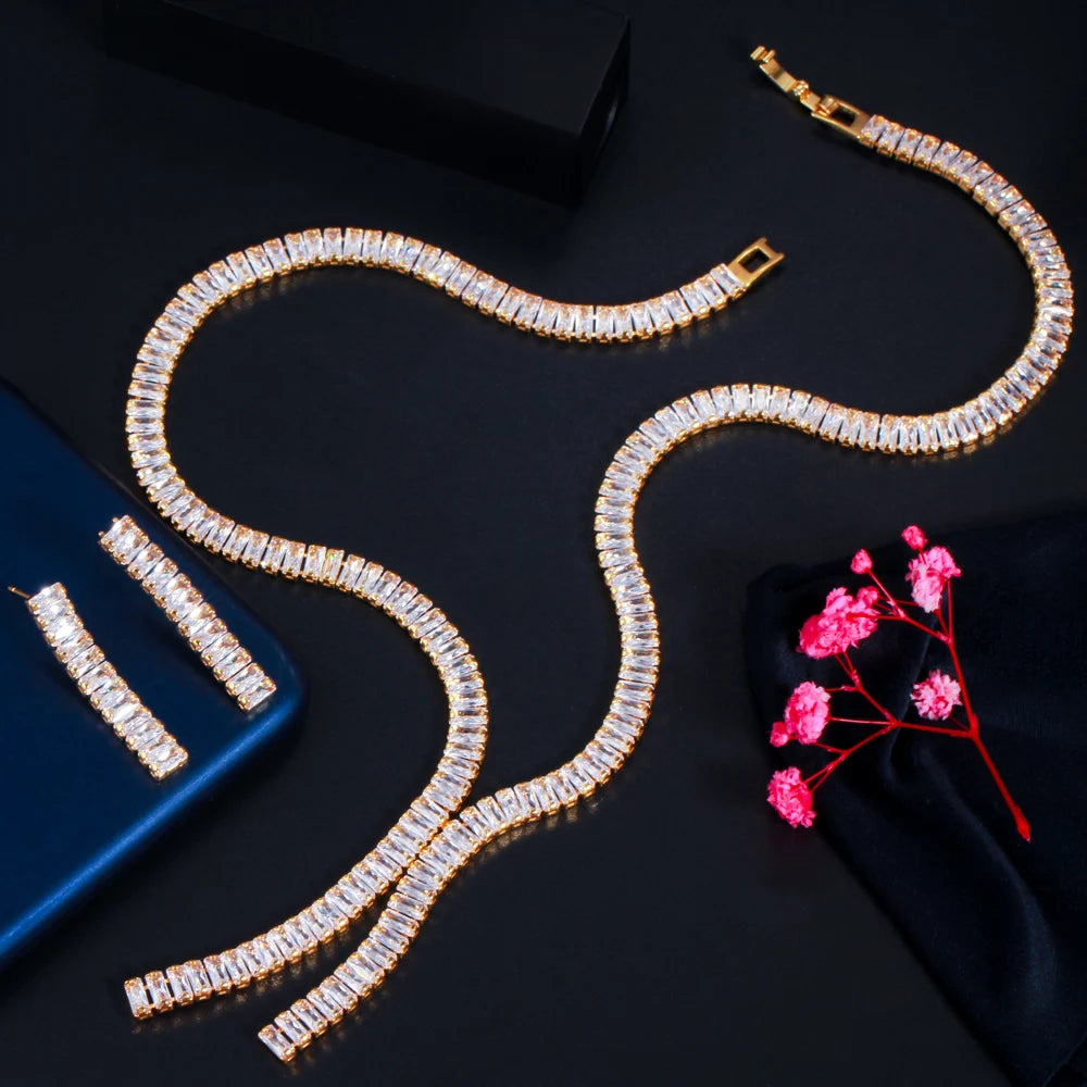 Clear baguette zircon necklace with matching drop earrings and gold-tone settings