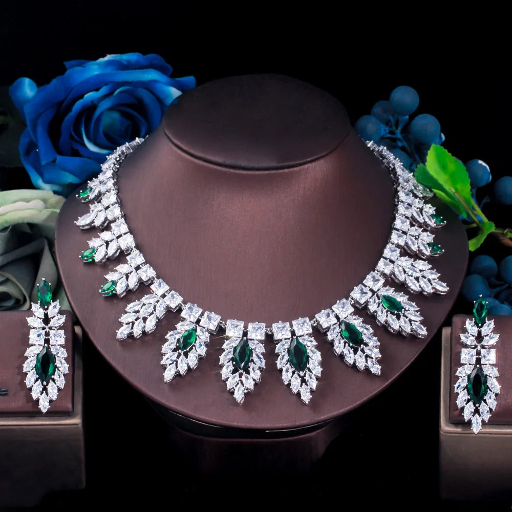 Bridal crystal necklace with green teardrop leaf drops and matching silver-tone earrings