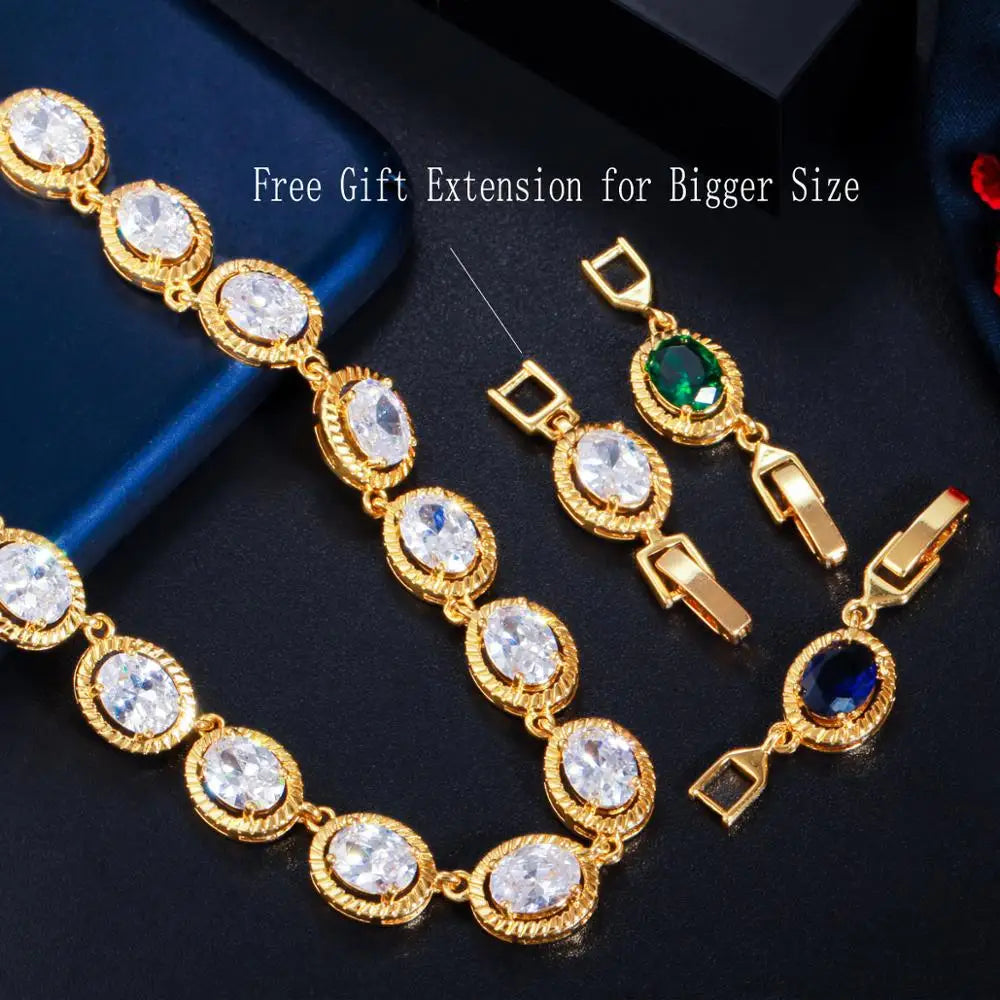 Gold-tone oval zircon necklace with removable extension links in clear, green and blue