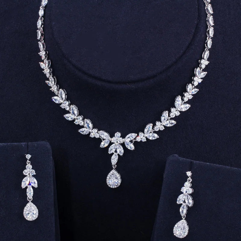 Silver-tone leaf necklace with teardrop pendant and matching drop earrings