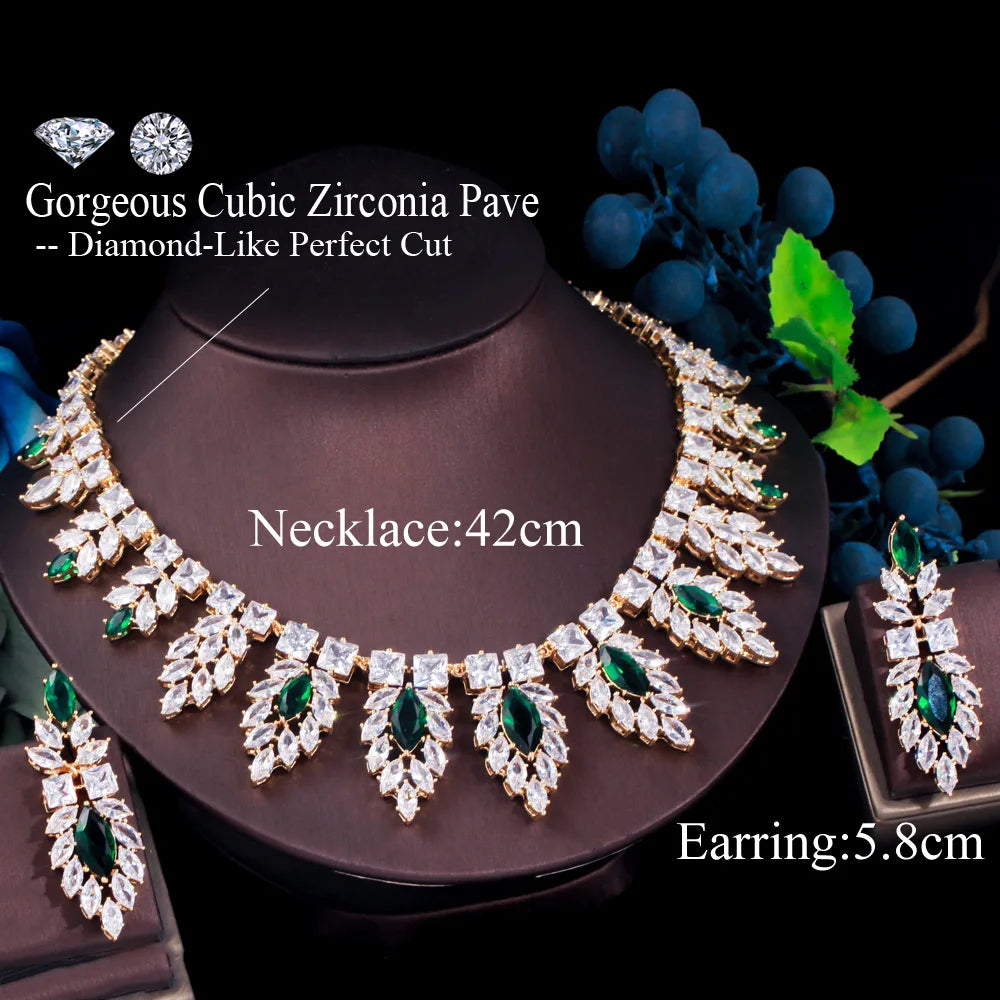 Silver-tone bridal jewelry set with green teardrop leaf necklace and matching drop earrings