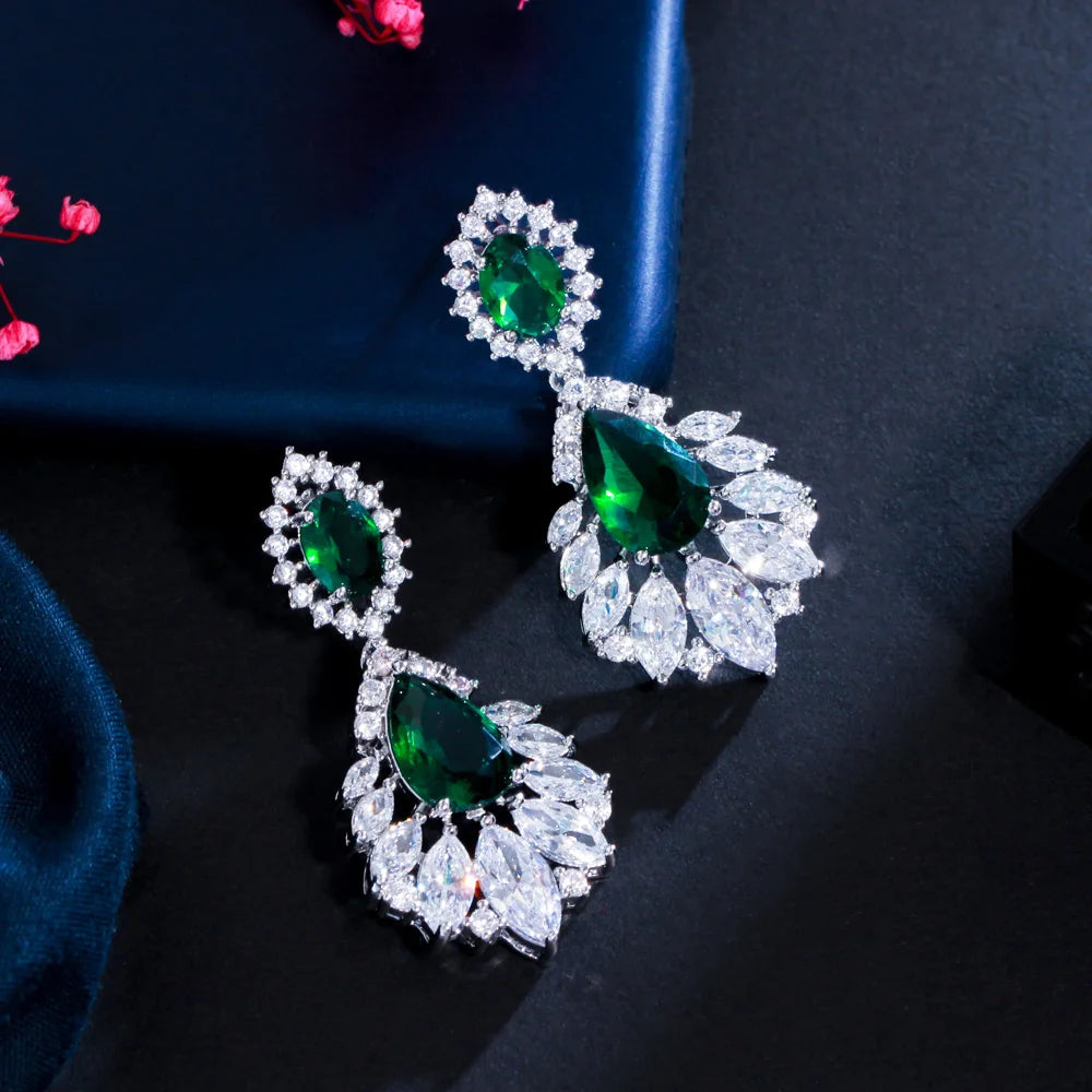 Green cubic zirconia drop earrings with clear marquise-cut accents