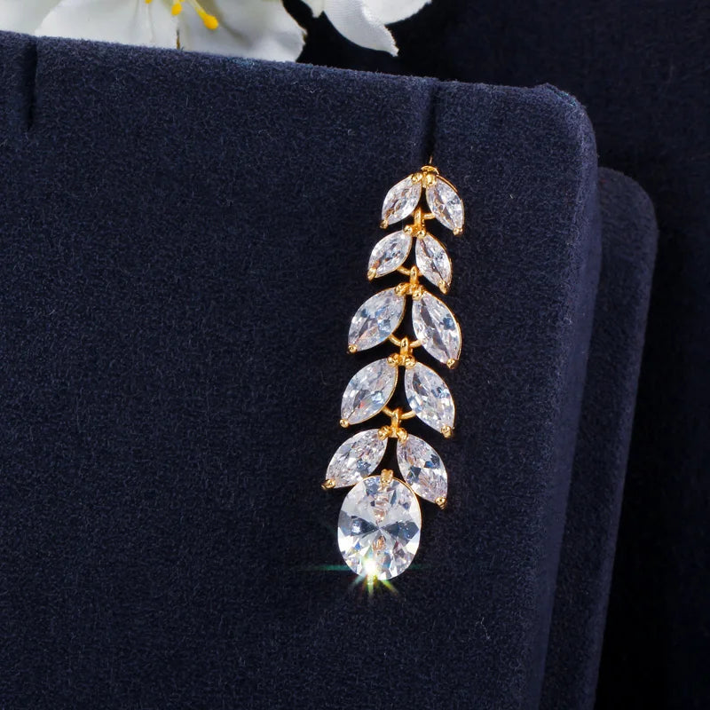 Gold-tone drop earring with marquise cubic zirconia leaves and oval stone