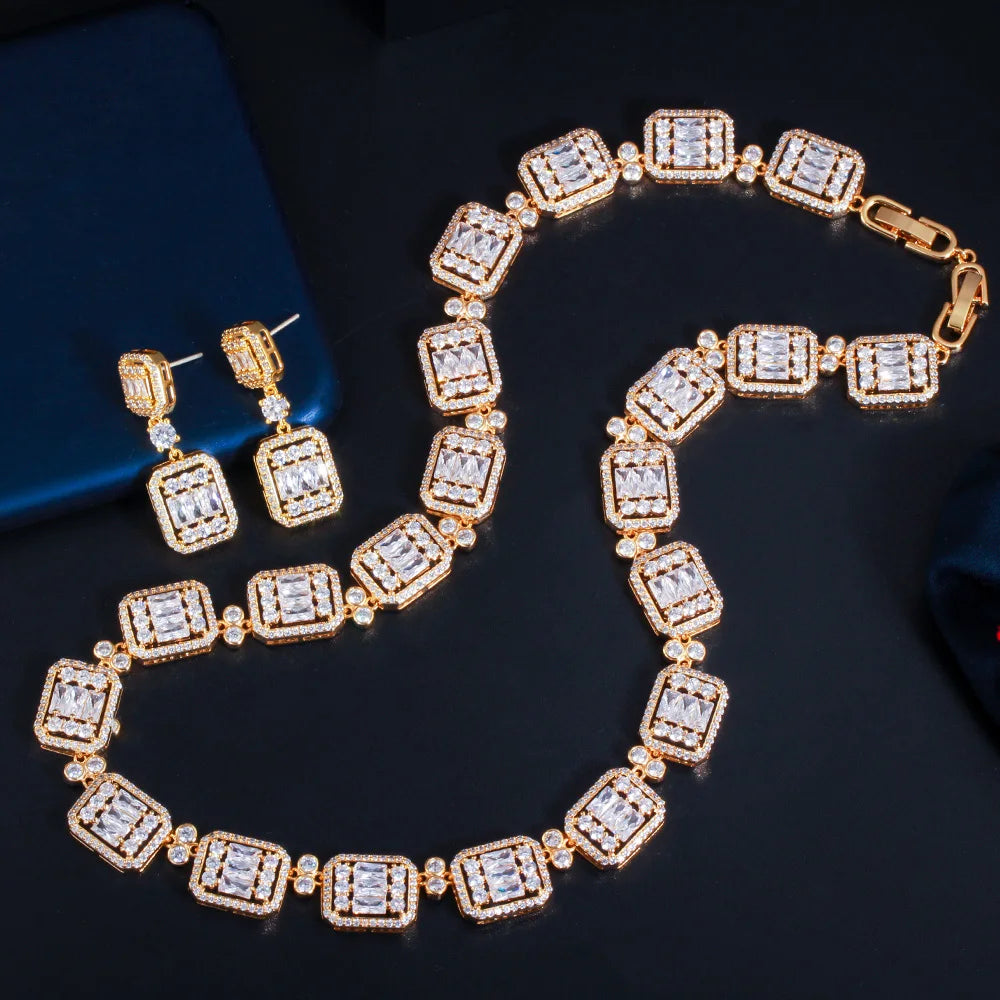 Gold-tone cubic zirconia geometric bridal necklace and matching drop earrings set