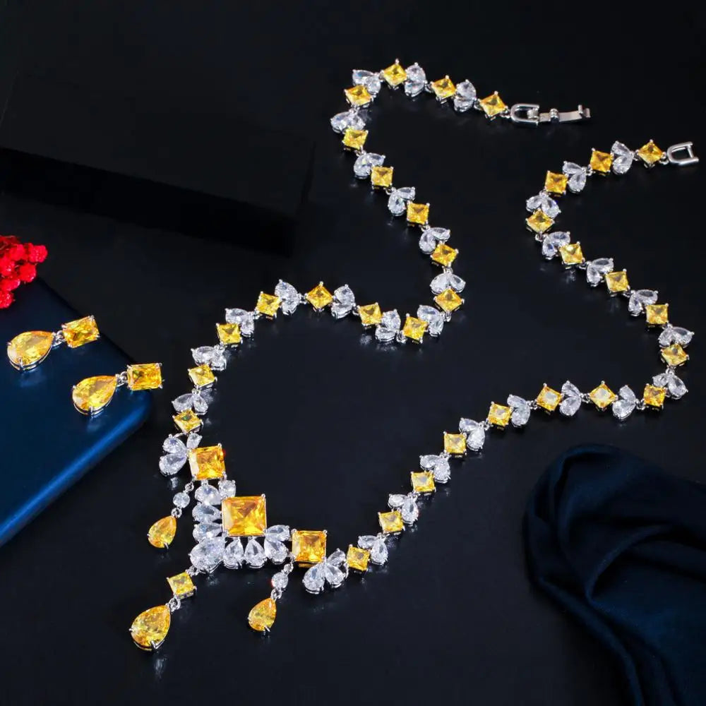 Full necklace and matching earrings with alternating square yellow and clear stones