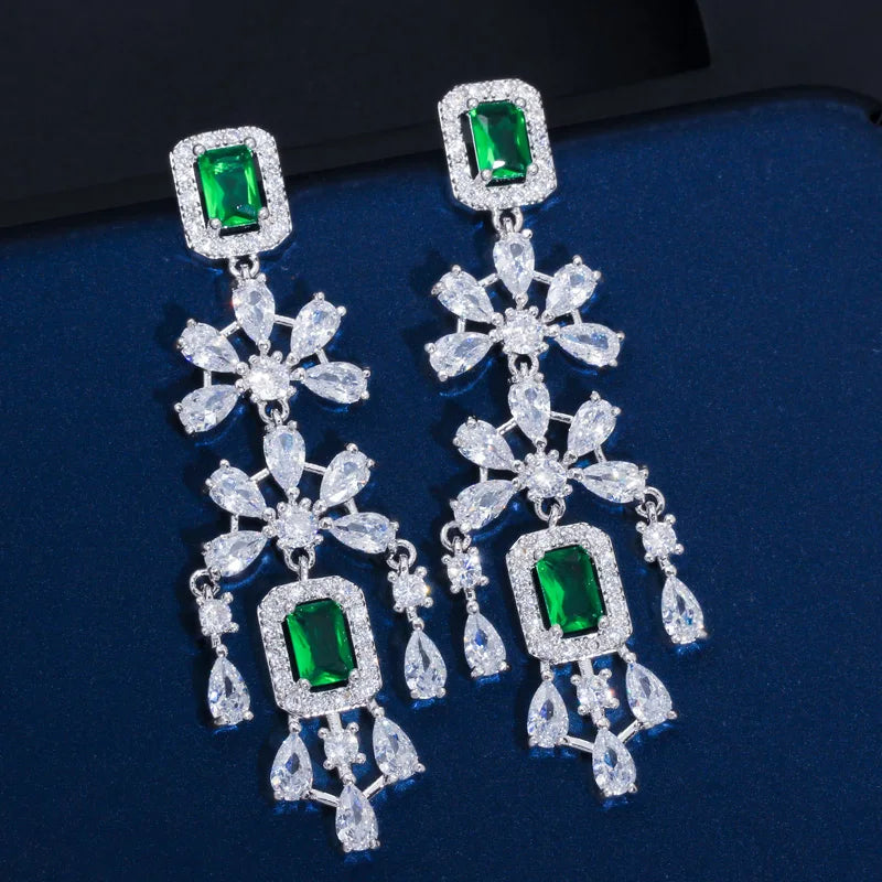 Cubic zirconia necklace and drop earrings set with green square stones and silver-toned details
