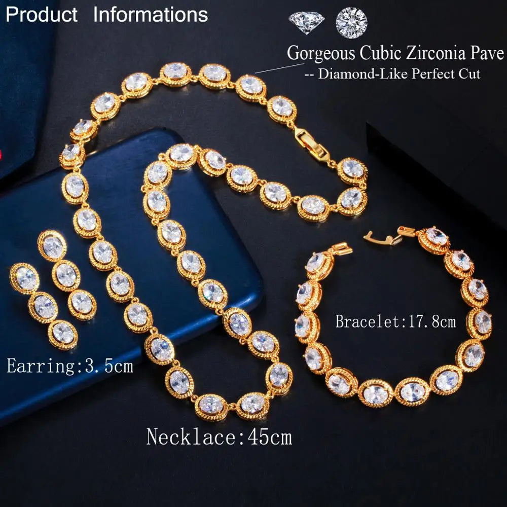 Gold-tone clear zircon necklace, bracelet and earrings with size labels