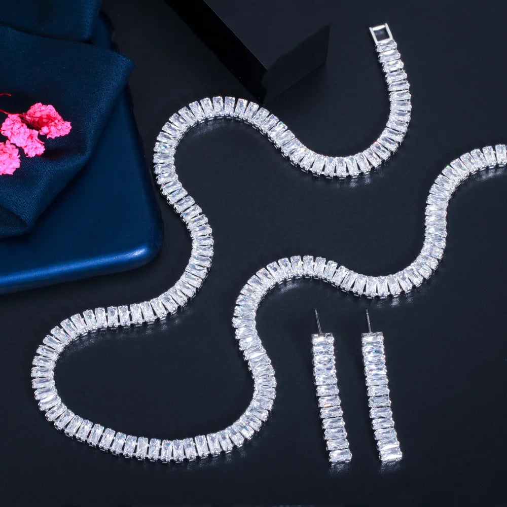 Silver-tone necklace and matching drop earrings with rectangular clear stones