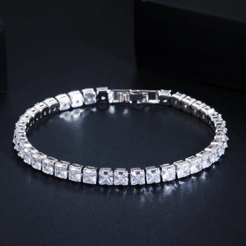 Silver-tone tennis bracelet with rows of square cubic zirconia stones and clasp